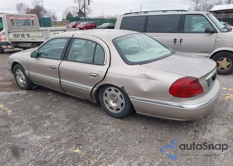 2002 Lincoln Continental из США, поврежденный, VIN 1LNHM97V32Y627465